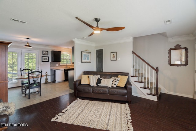8431 Vessel Ln, Powell, TN 37849 - living room with a ceiling fan, hardwood / wood-style floors, ornamental molding, and stairs
