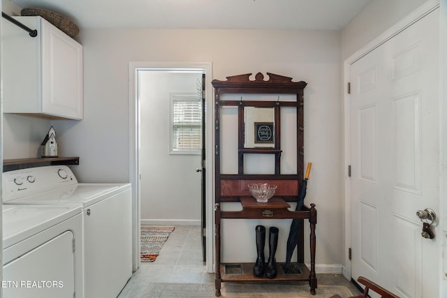 8431 Vessel Ln, Powell, TN 37849 - laundry room featuring separate washer and dryer and cabinet space