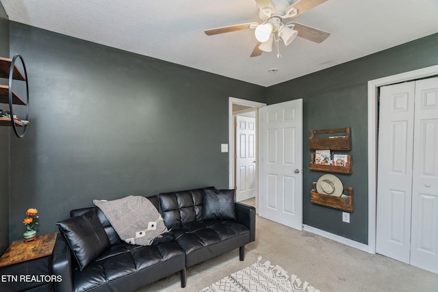 8431 Vessel Ln, Powell, TN 37849 - living area with ceiling fan and light colored carpet