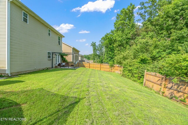 8431 Vessel Ln, Powell, TN 37849 - fenced yard with a patio area
