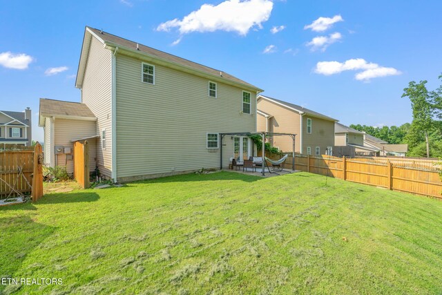 8431 Vessel Ln, Powell, TN 37849 - rear view of house featuring a patio area and a fenced backyard
