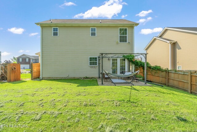 8431 Vessel Ln, Powell, TN 37849 - rear view of house with a patio area, a fenced backyard, and a pergola