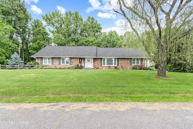 314 Longview Dr, Wartburg, TN 37887 - ranch-style house with a shingled roof and brick siding