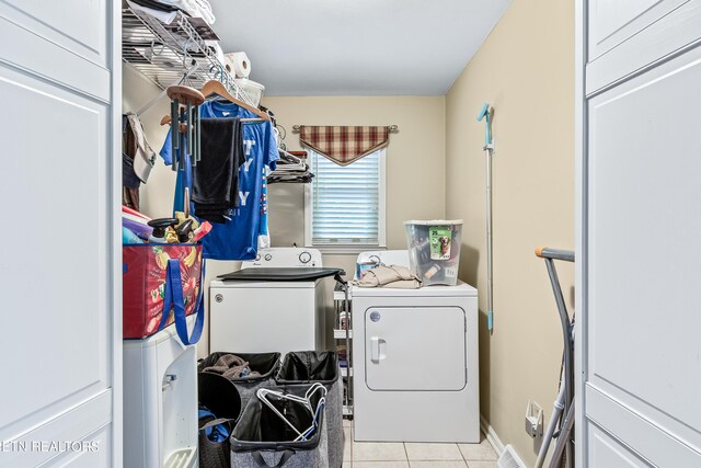 314 Longview Dr, Wartburg, TN 37887 - washroom with separate washer and dryer and light tile patterned floors