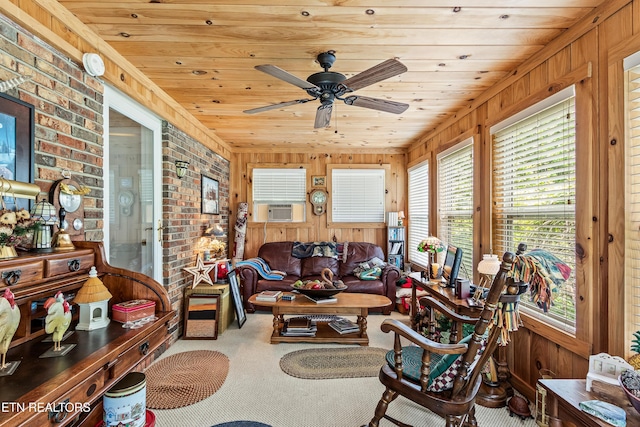 314 Longview Dr, Wartburg, TN 37887 - living area with wood ceiling, healthy amount of natural light, wood walls, brick wall, and a ceiling fan