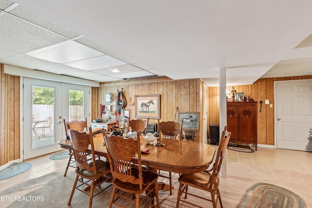 314 Longview Dr, Wartburg, TN 37887 - dining room featuring wooden walls, french doors, and light tile patterned flooring