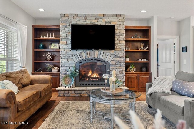 3292 Moss Arcott Rd, Celina, TN 38551 - living area with wood finished floors, a fireplace, and recessed lighting