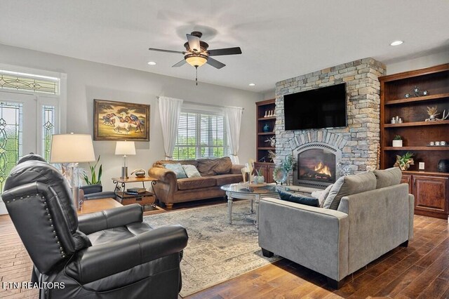 3292 Moss Arcott Rd, Celina, TN 38551 - living area with ceiling fan, a stone fireplace, dark wood finished floors, and recessed lighting