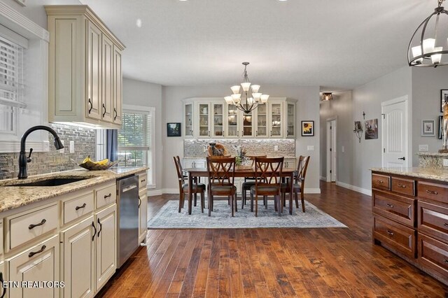 3292 Moss Arcott Rd, Celina, TN 38551 - dining space with a chandelier, dark wood finished floors, and baseboards