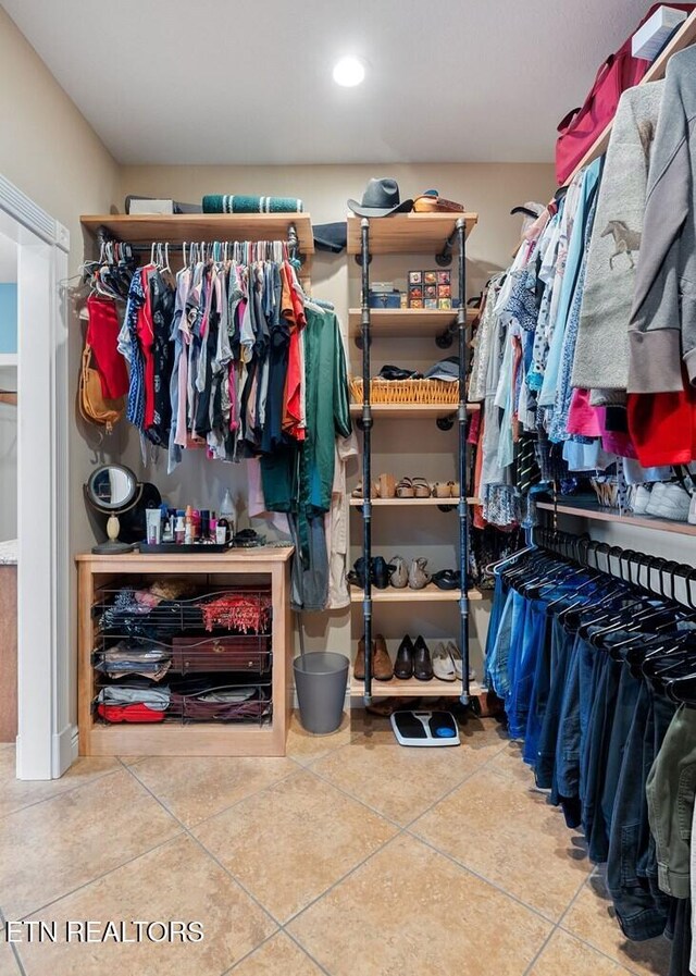 3292 Moss Arcott Rd, Celina, TN 38551 - spacious closet featuring tile patterned floors