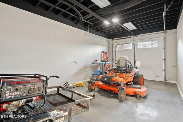 3292 Moss Arcott Rd, Celina, TN 38551 - garage with baseboards