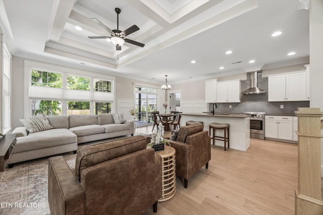 1007 Wigmore Way, Knoxville, TN 37932 - living room featuring crown molding, ceiling fan, recessed lighting, light wood-style flooring, and a decorative wall