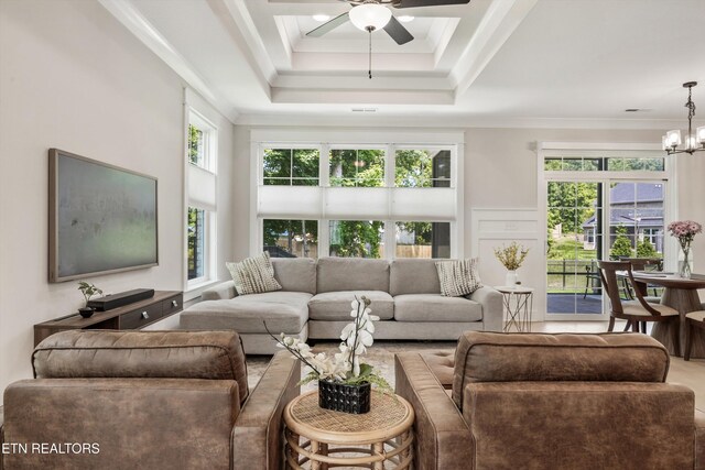 1007 Wigmore Way, Knoxville, TN 37932 - living room featuring ceiling fan, a chandelier, ornamental molding, and a raised ceiling