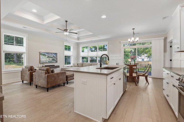 1007 Wigmore Way, Knoxville, TN 37932 - kitchen with light wood finished floors, a chandelier, ornamental molding, open floor plan, and plenty of natural light