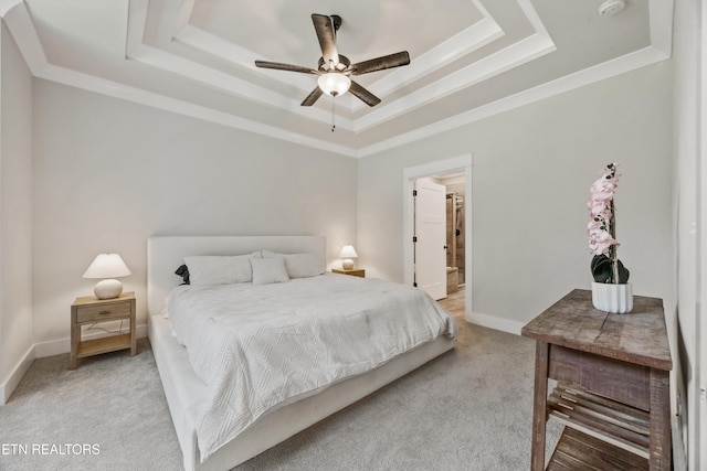 1007 Wigmore Way, Knoxville, TN 37932 - bedroom featuring a tray ceiling, light carpet, crown molding, ceiling fan, and ensuite bath