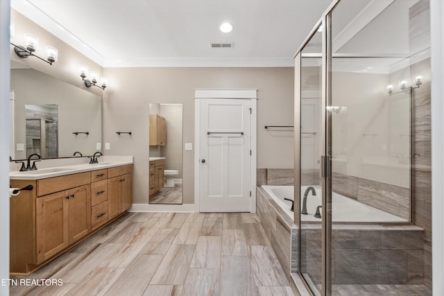1007 Wigmore Way, Knoxville, TN 37932 - bathroom featuring double vanity, a garden tub, a stall shower, and ornamental molding