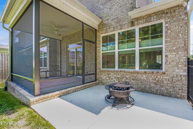 1007 Wigmore Way, Knoxville, TN 37932 - view of patio / terrace featuring an outdoor fire pit, ceiling fan, and a sunroom