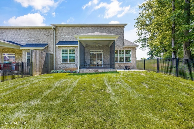 1007 Wigmore Way, Knoxville, TN 37932 - rear view of property featuring brick siding, a ceiling fan, a fenced backyard, and a patio