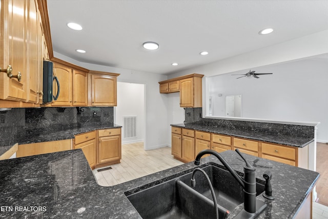 140 Chuniloti Way, Loudon, TN 37774 - kitchen with tasteful backsplash, light wood-style floors, a ceiling fan, black microwave, and recessed lighting