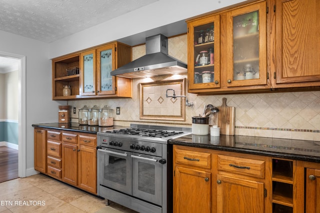 1312 Zachary Taylor Rd, Knoxville, TN 37922 - kitchen featuring double oven range, wall chimney range hood, open shelves, brown cabinets, and a textured ceiling