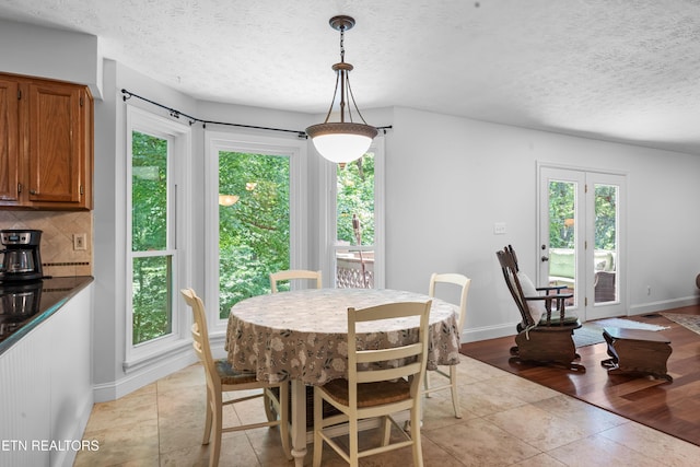 1312 Zachary Taylor Rd, Knoxville, TN 37922 - dining space with a textured ceiling and light tile patterned flooring