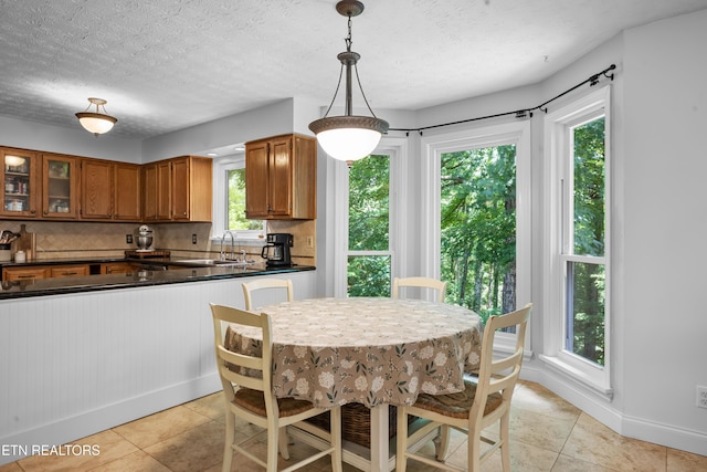1312 Zachary Taylor Rd, Knoxville, TN 37922 - dining room with light tile patterned floors and a textured ceiling