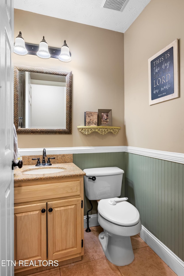 1312 Zachary Taylor Rd, Knoxville, TN 37922 - half bath with vanity, a wainscoted wall, tile patterned flooring, and a baseboard radiator