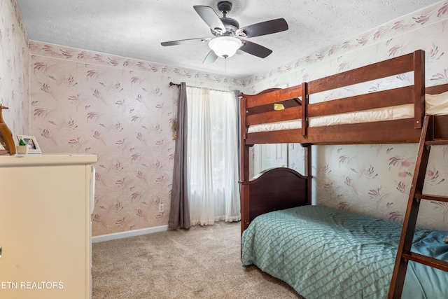 1312 Zachary Taylor Rd, Knoxville, TN 37922 - carpeted bedroom featuring a textured ceiling, wallpapered walls, and ceiling fan