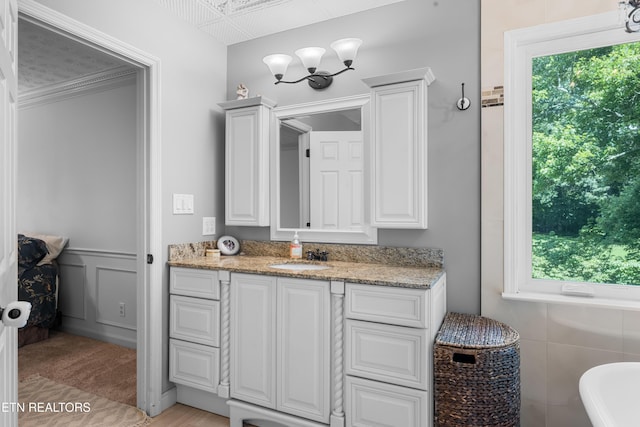 1312 Zachary Taylor Rd, Knoxville, TN 37922 - bathroom featuring vanity, a soaking tub, and a wainscoted wall