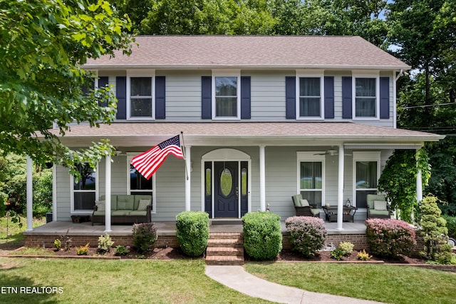 1312 Zachary Taylor Rd, Knoxville, TN 37922 - view of front of property with covered porch, a front yard, and a shingled roof