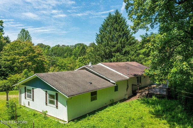 775 Middle Creek Rd, Cosby, TN 37722 - back of property featuring roof with shingles, a deck, and a view of trees