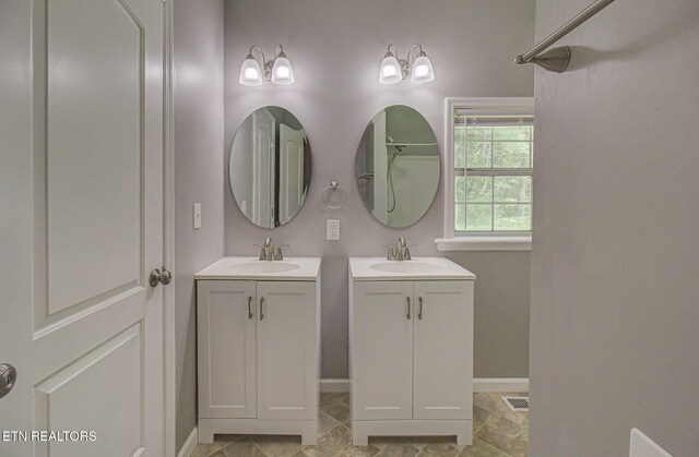 775 Middle Creek Rd, Cosby, TN 37722 - full bath with two vanities and baseboards