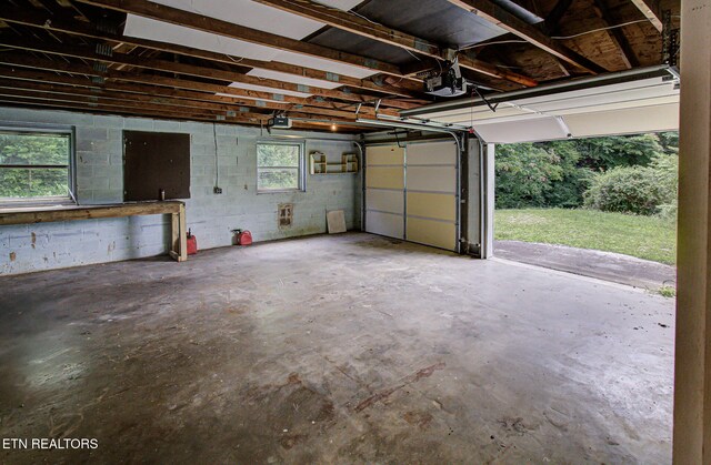 775 Middle Creek Rd, Cosby, TN 37722 - garage with concrete block wall and a garage door opener