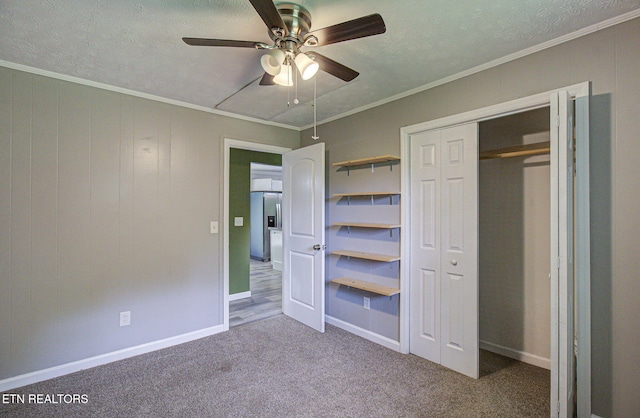 775 Middle Creek Rd, Cosby, TN 37722 - unfurnished bedroom with stainless steel fridge, carpet, crown molding, ceiling fan, and a closet