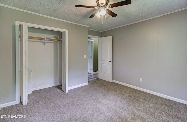 775 Middle Creek Rd, Cosby, TN 37722 - unfurnished bedroom with carpet, a textured ceiling, a closet, ornamental molding, and a ceiling fan