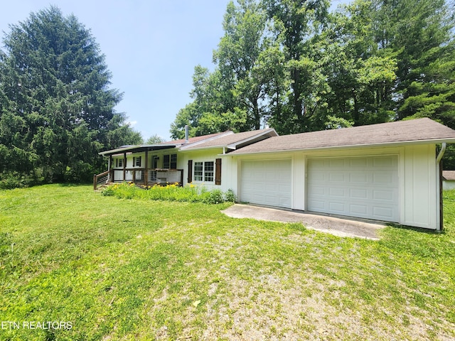 775 Middle Creek Rd, Cosby, TN 37722 - view of front of house with a front lawn, a porch, board and batten siding, and driveway