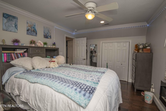 1246 Laurel Bluff Rd, Kingston, TN 37763 - bedroom with ornamental molding, dark wood-style flooring, a closet, and a ceiling fan