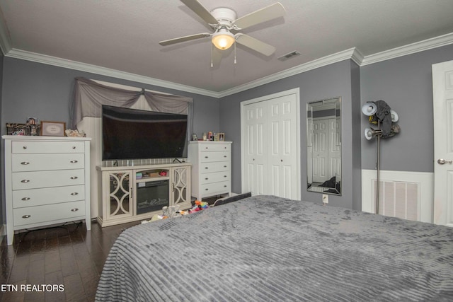 1246 Laurel Bluff Rd, Kingston, TN 37763 - bedroom with crown molding, dark wood finished floors, a closet, and a ceiling fan
