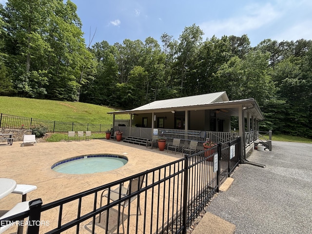 226 Mountain Crest Dr, Lafollette, TN 37766 - view of swimming pool featuring an in-ground hot tub and a patio area