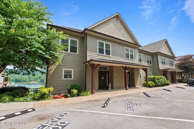 140 Broadleaf Ln Unit 100, Caryville, TN 37714 - view of front of property with uncovered parking and covered porch