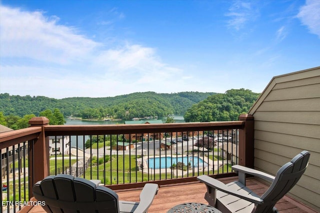 140 Broadleaf Ln Unit 100, Caryville, TN 37714 - balcony with a view of trees, a water view, and view of pool