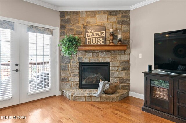 140 Broadleaf Ln Unit 100, Caryville, TN 37714 - living area with a fireplace, ornamental molding, and wood finished floors