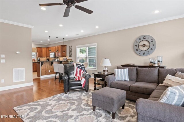 140 Broadleaf Ln Unit 100, Caryville, TN 37714 - living area featuring ornamental molding, light wood-style floors, ceiling fan, and recessed lighting