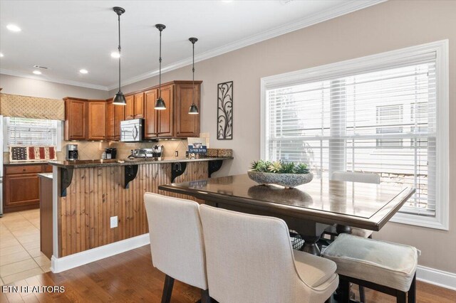 140 Broadleaf Ln Unit 100, Caryville, TN 37714 - dining area with ornamental molding, recessed lighting, and light wood-style flooring