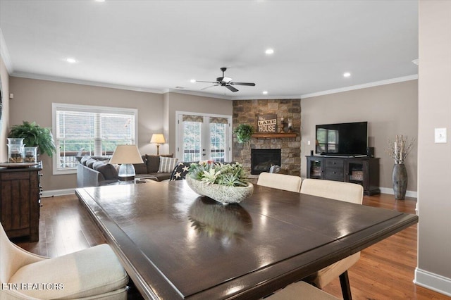 140 Broadleaf Ln Unit 100, Caryville, TN 37714 - dining space featuring a ceiling fan, crown molding, wood finished floors, recessed lighting, and a fireplace
