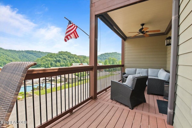 140 Broadleaf Ln Unit 100, Caryville, TN 37714 - wooden terrace featuring a ceiling fan and a view of trees