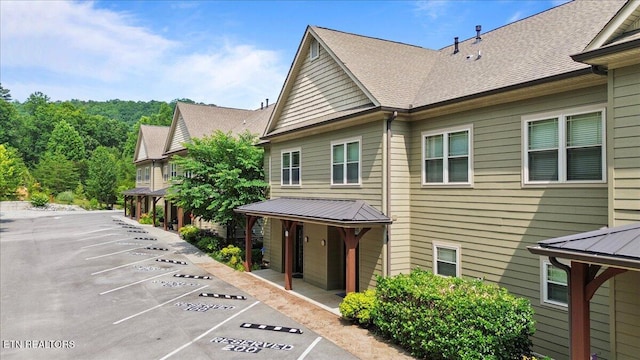 140 Broadleaf Ln Unit 100, Caryville, TN 37714 - view of property featuring uncovered parking
