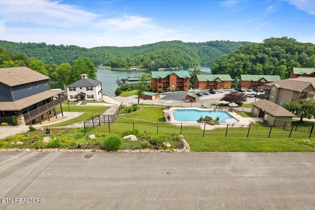 140 Broadleaf Ln Unit 100, Caryville, TN 37714 - drone / aerial view of a heavily wooded area and a nearby body of water