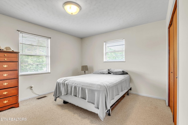 3413 N Fountaincrest Dr, Knoxville, TN 37918 - bedroom with light carpet and baseboards