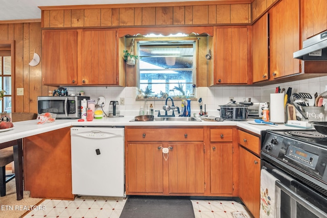 3413 N Fountaincrest Dr, Knoxville, TN 37918 - kitchen with white dishwasher, stainless steel microwave, stove, light countertops, and tasteful backsplash